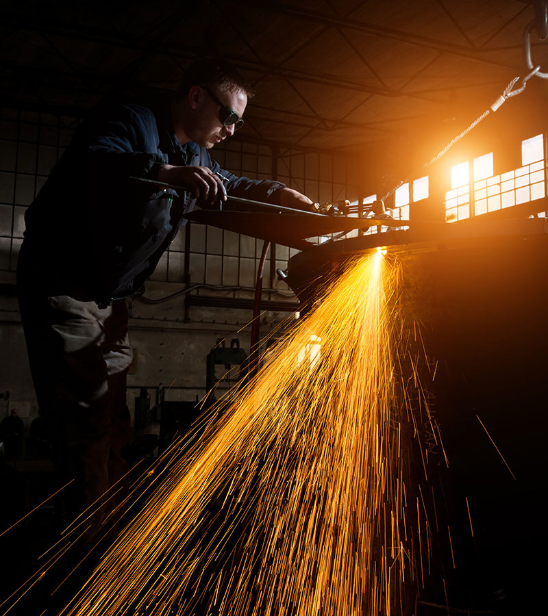 welder working at the factory 3ATMXRR 1